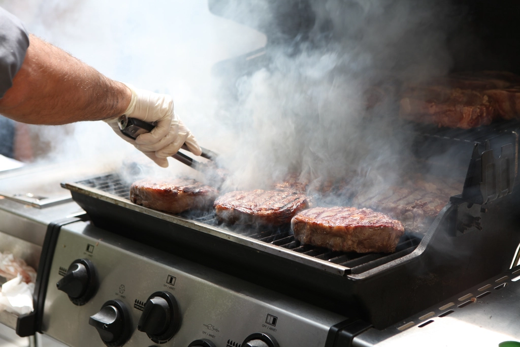 Smokeless indoor electric grill on a kitchen counter