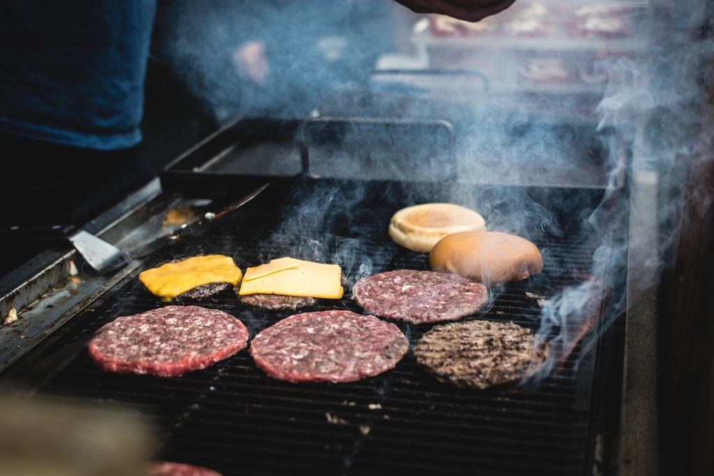Burgers grilling on an electric grill